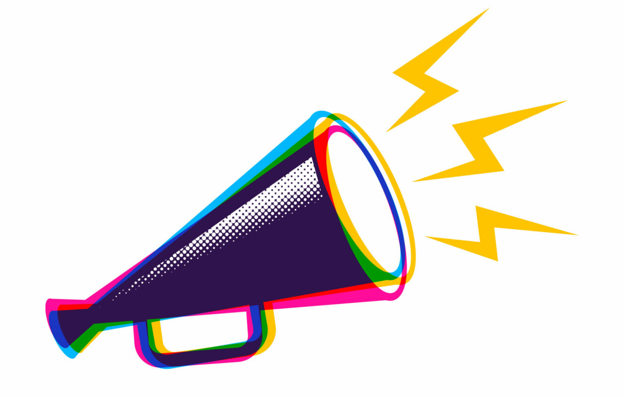 Retro megaphone in CMYK colors.